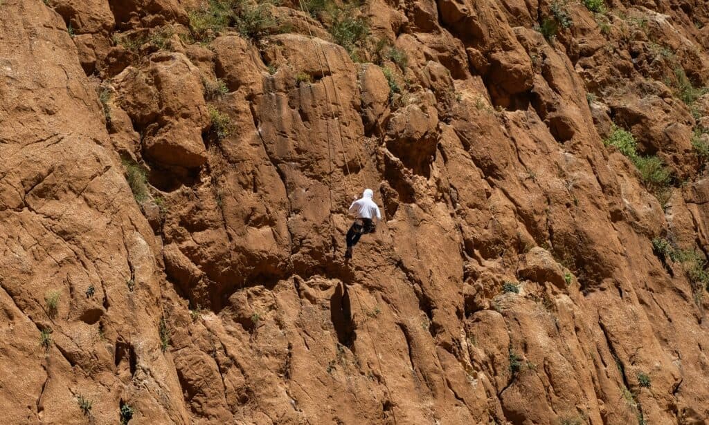 Rock climbing on the cliffs of Todra Gorge Morocco